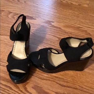 Black Sandle platforms.